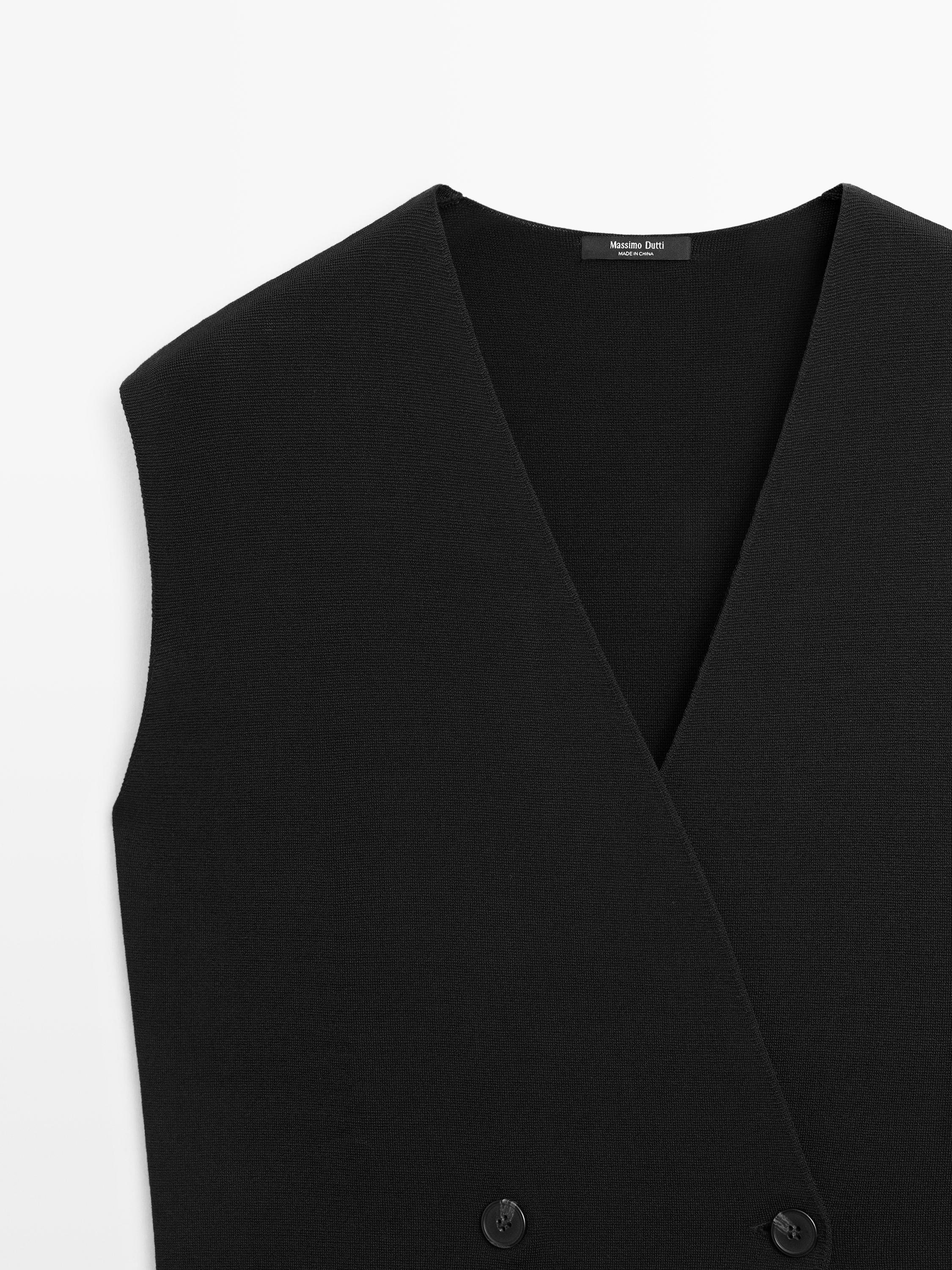 Long double-breasted vest